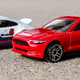 Porsche 911 GT3 RS, Porsche 911 Carrera RS, 2015 Ford Mustang GT, and 1965 Ford Mustang. Photo credit MustangFan